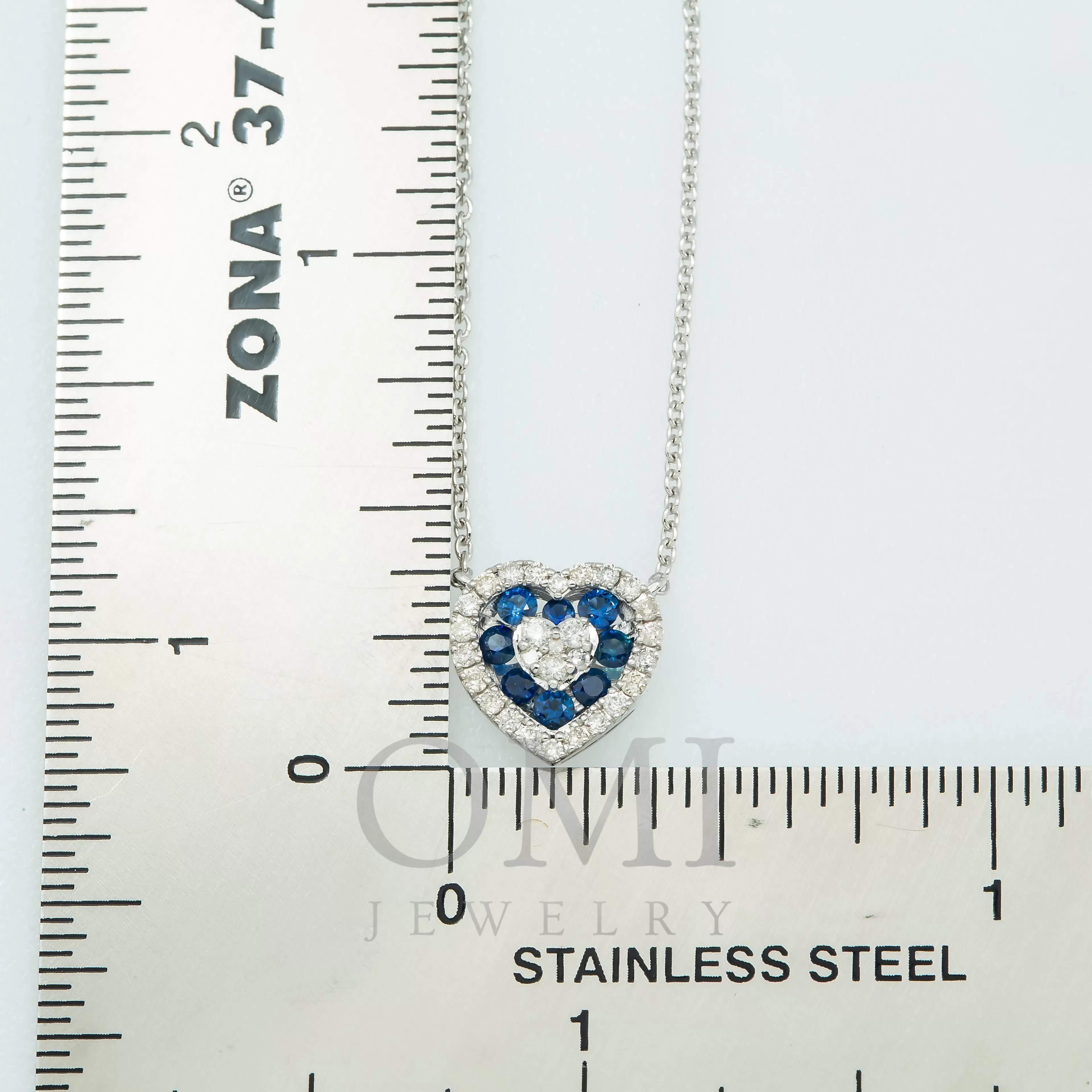 14K GOLD ROUND DIAMOND AND BLUE SAPPHIRE HEART NECKLACE 0.55 CTW