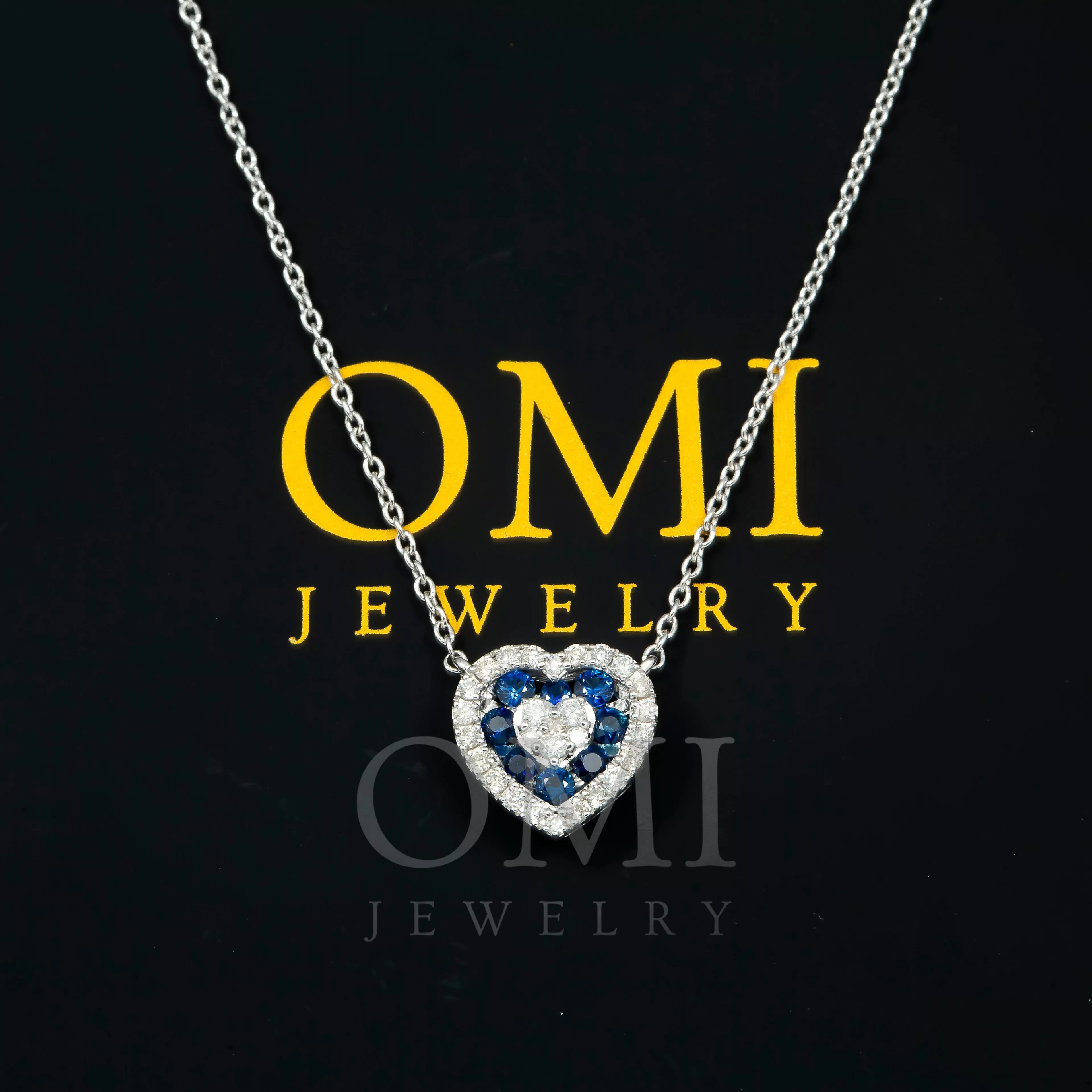 14K GOLD ROUND DIAMOND AND BLUE SAPPHIRE HEART NECKLACE 0.55 CTW