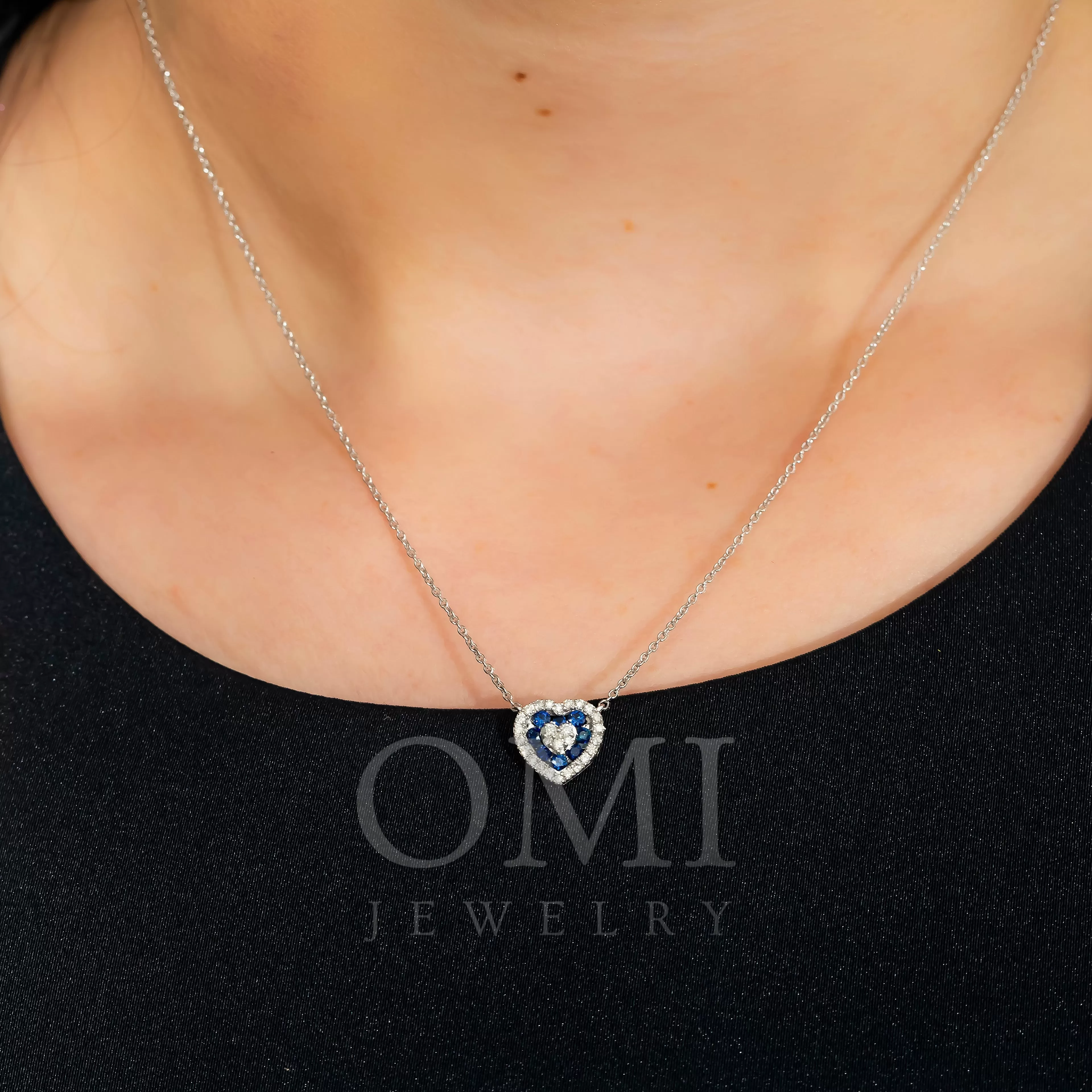 14K GOLD ROUND DIAMOND AND BLUE SAPPHIRE HEART NECKLACE 0.55 CTW